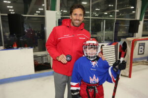Henrik Lundqvist runs drills with young athletes, and empowers all hockey players, regardless of experience or gender, to work hard in order to take their game to the next level.