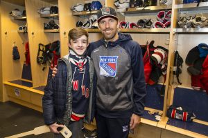 John and his family visit Henrik post a game in locker room at MSG!